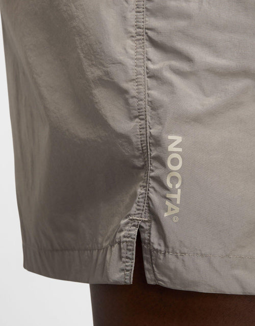 กางเกงขาสั้น NOCTA Woven (Unisex)
