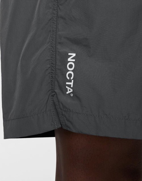 กางเกงขาสั้น NOCTA Woven (Unisex)