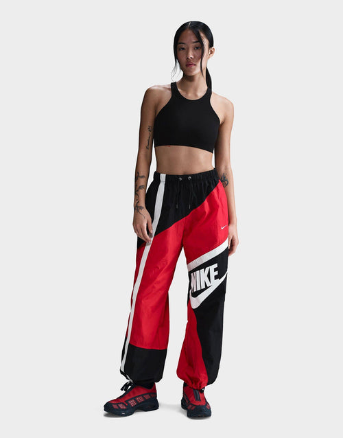 กางเกงขายาวผู้หญิง Sportswear Mid-Rise Loose Woven Open-Hem