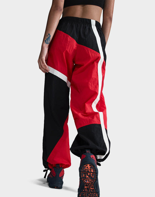 กางเกงขายาวผู้หญิง Sportswear Mid-Rise Loose Woven Open-Hem