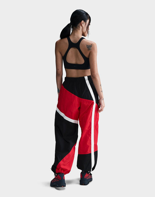 กางเกงขายาวผู้หญิง Sportswear Mid-Rise Loose Woven Open-Hem
