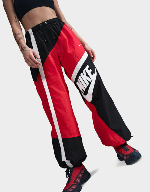 กางเกงขายาวผู้หญิง Sportswear Mid-Rise Loose Woven Open-Hem