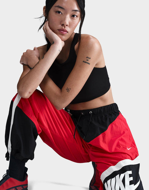 กางเกงขายาวผู้หญิง Sportswear Mid-Rise Loose Woven Open-Hem