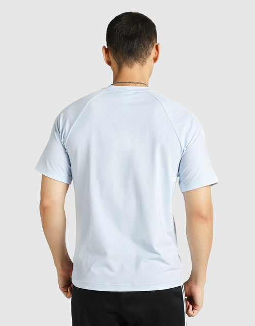 เสื้อยืดผู้ชาย Tech Trefoil Essentials
