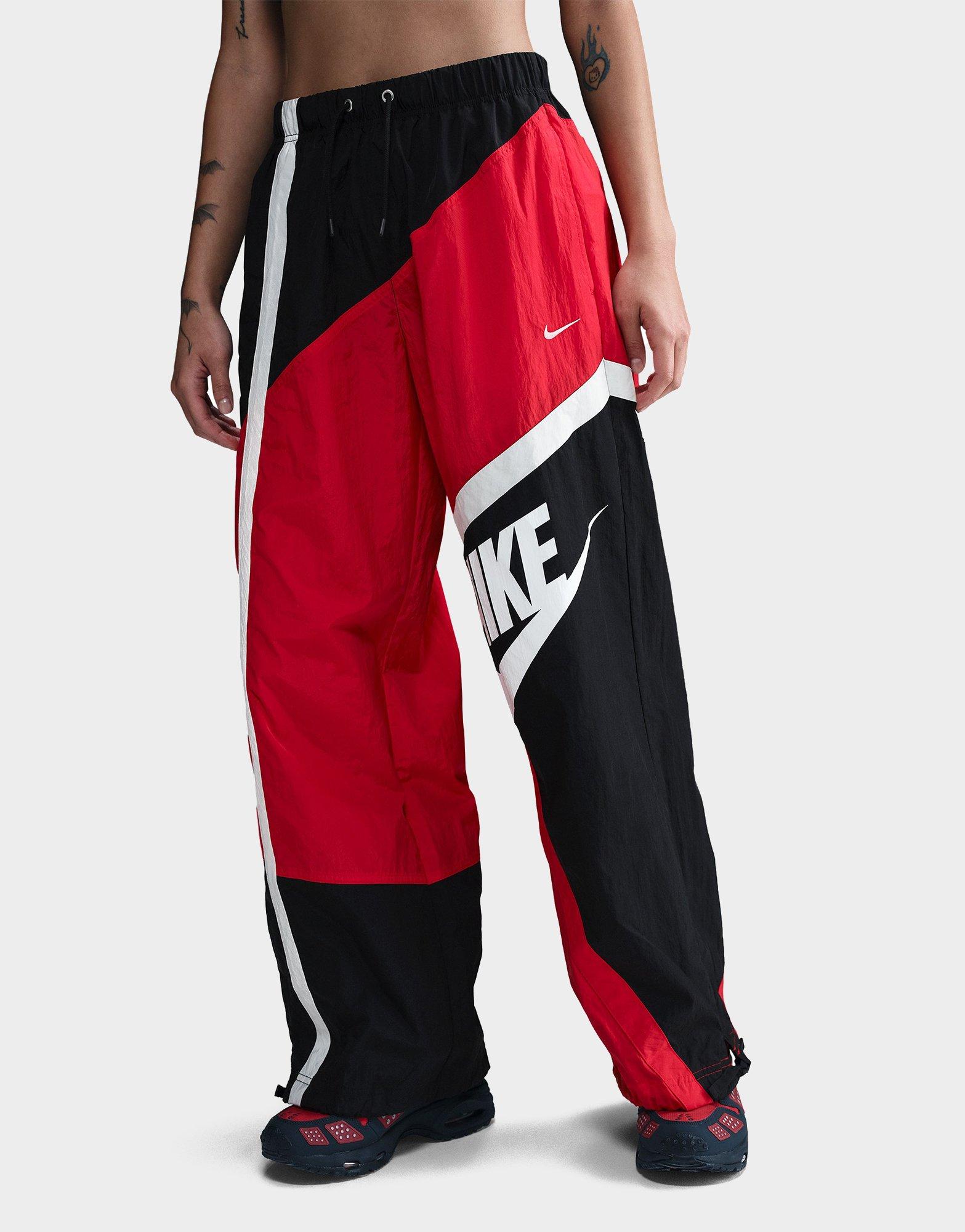 กางเกงขายาวผู้หญิง Sportswear Mid-Rise Loose Woven Open-Hem