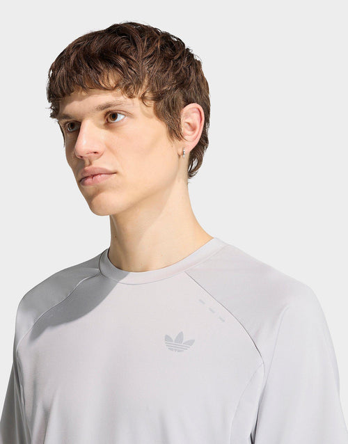เสื้อยืดผู้ชาย Tech Trefoil Essentials