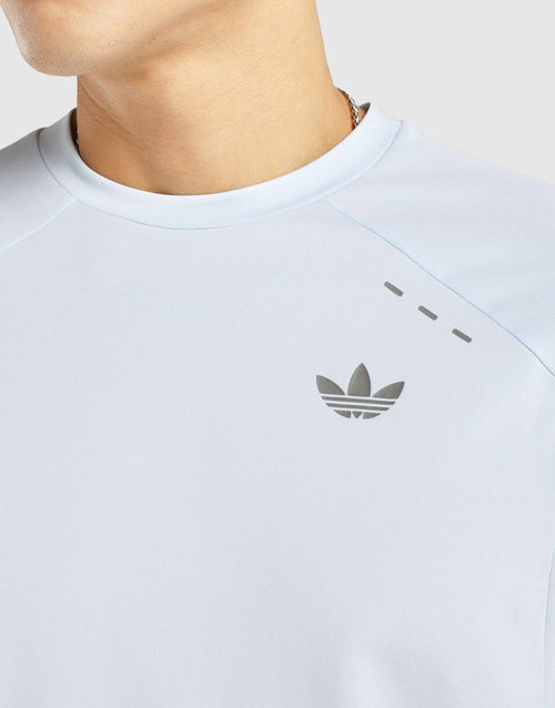 เสื้อยืดผู้ชาย Tech Trefoil Essentials